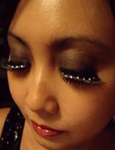 Model, wearing<br> sparkle-crystal lash